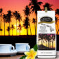 Bag of Island Sunset coffee on a table with sunset and palm tree background