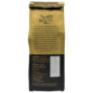 Back view of one eight ounce bag of Royal Kona Vanilla macadamia ten percent kona coffee, ground. Brown and gold bag