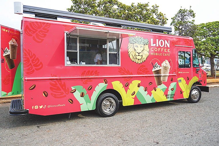 Lion Mobile Coffee Truck with people enjoying coffee drinks